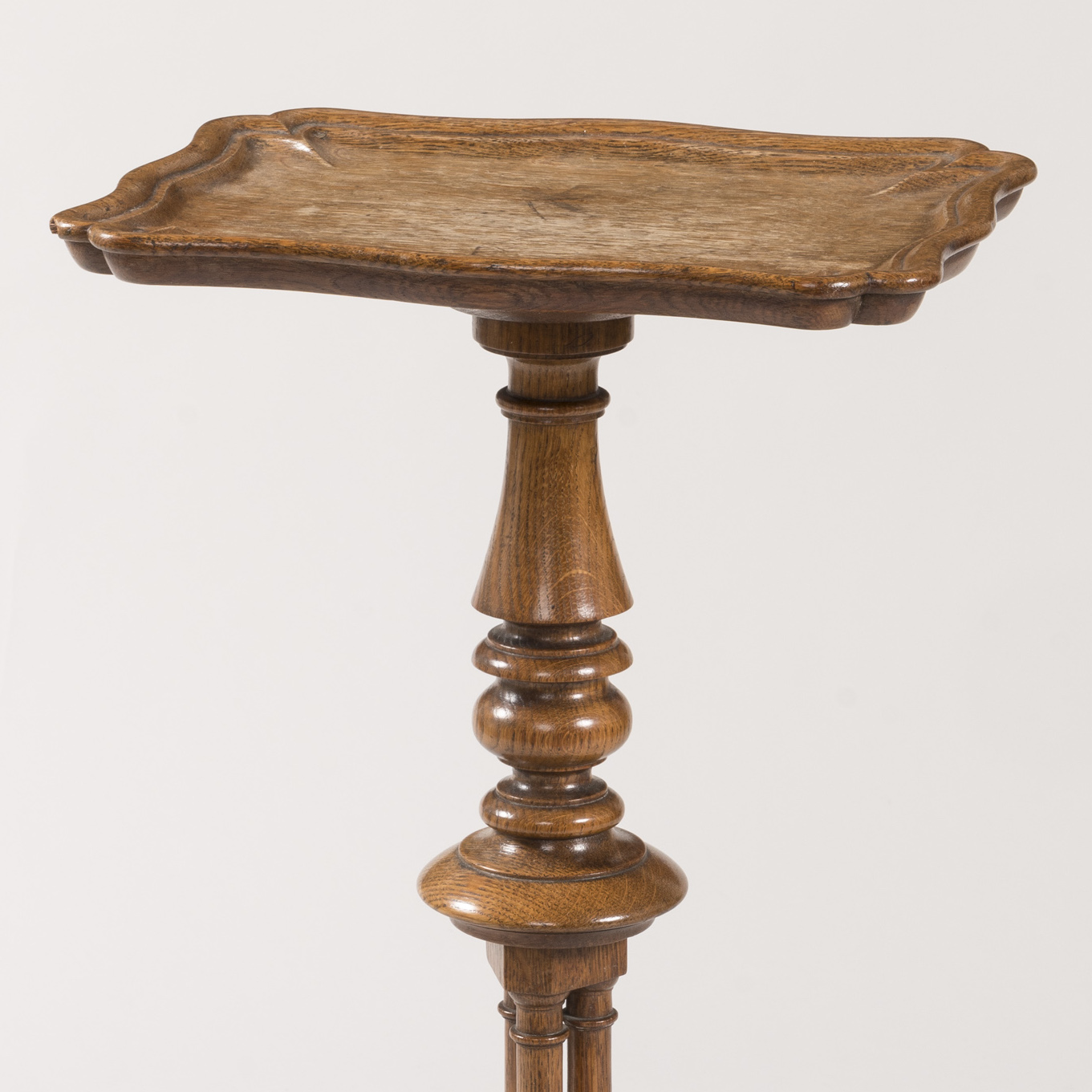 A Matched Pair of Oak Tripod Tables